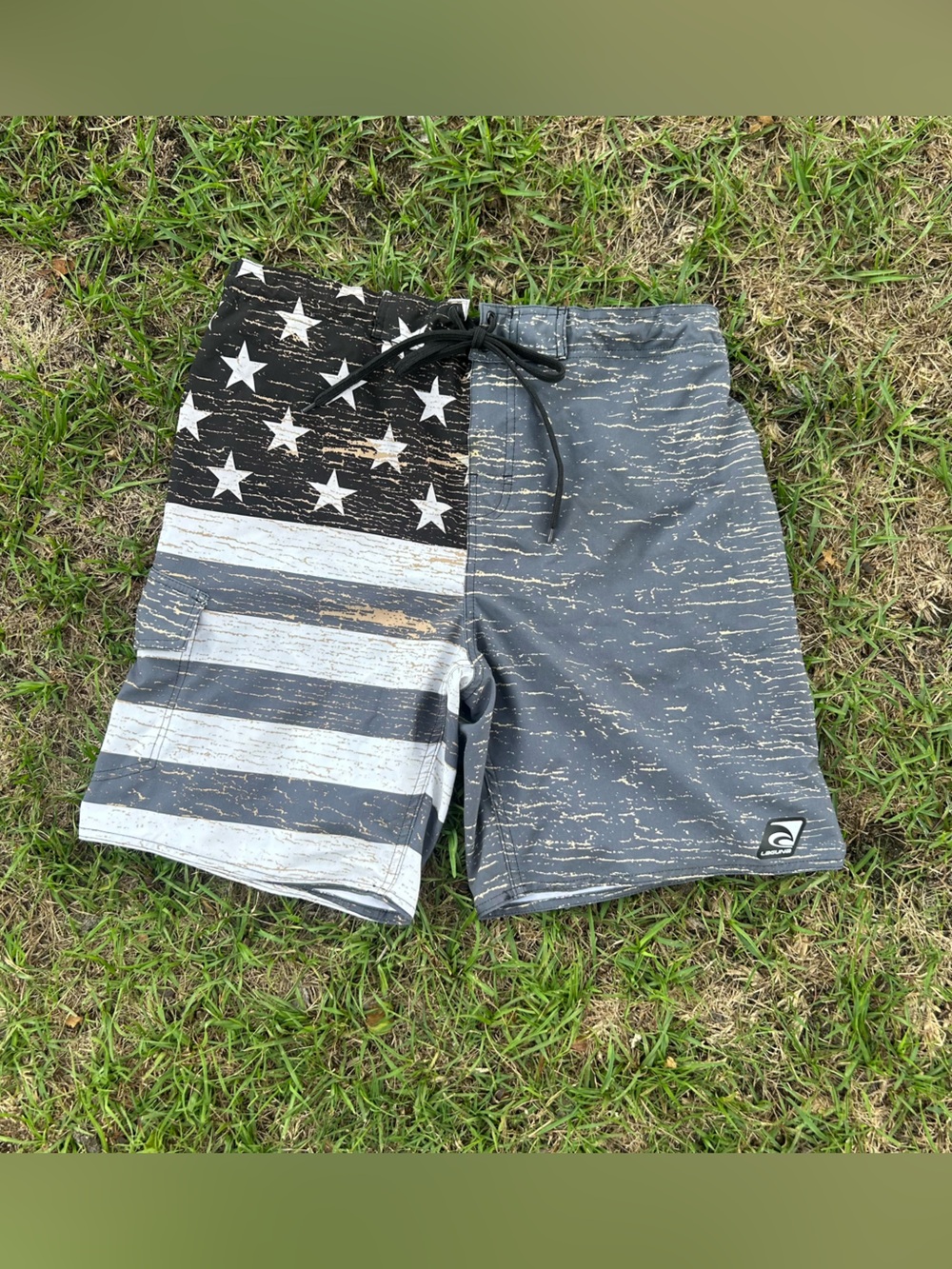 Laguna brand American Flag charcoal gray board shorts